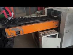 Model 500B, 4-blade, screenless shredder for shoe factory leather scraps, 7-layer feeding.